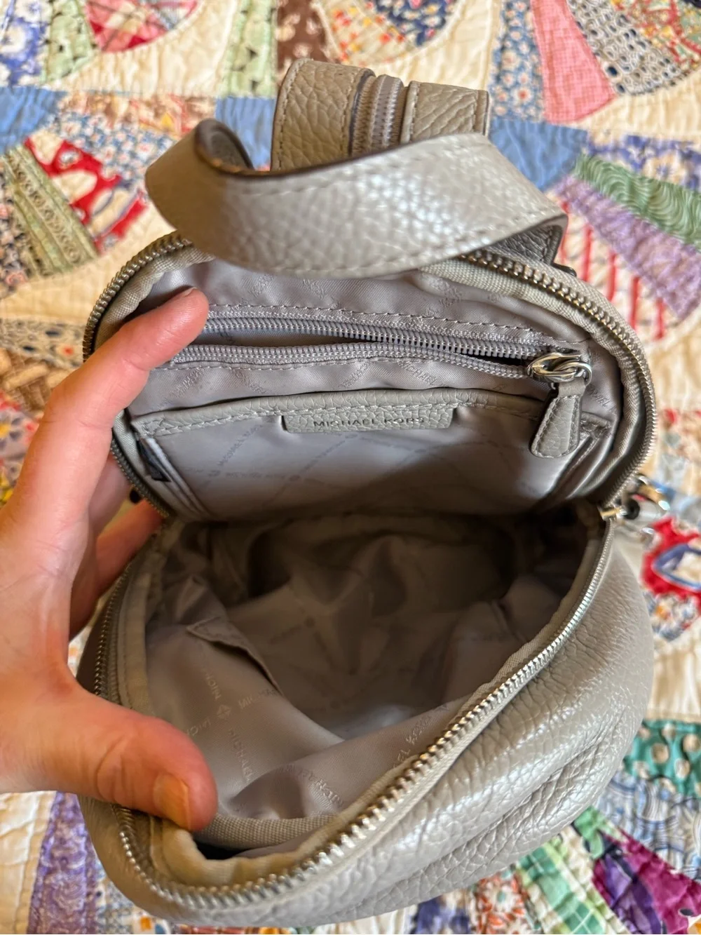 Michael Kors Pebbled Leather Mini Backpack in Light Gray with Gold Hardware